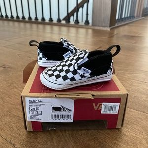 Vans black and white slip on shoes